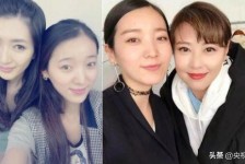 镇江7旬奶奶带盲老伴游遍中国(小女孩扶盲人老奶奶过马路)